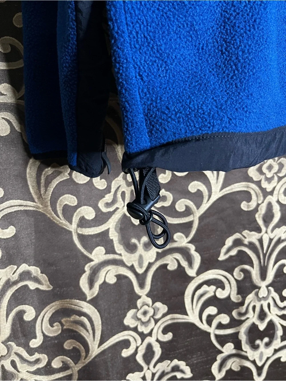 The North Face Men’s Black Denali Jacket with Blue Fleece Lining